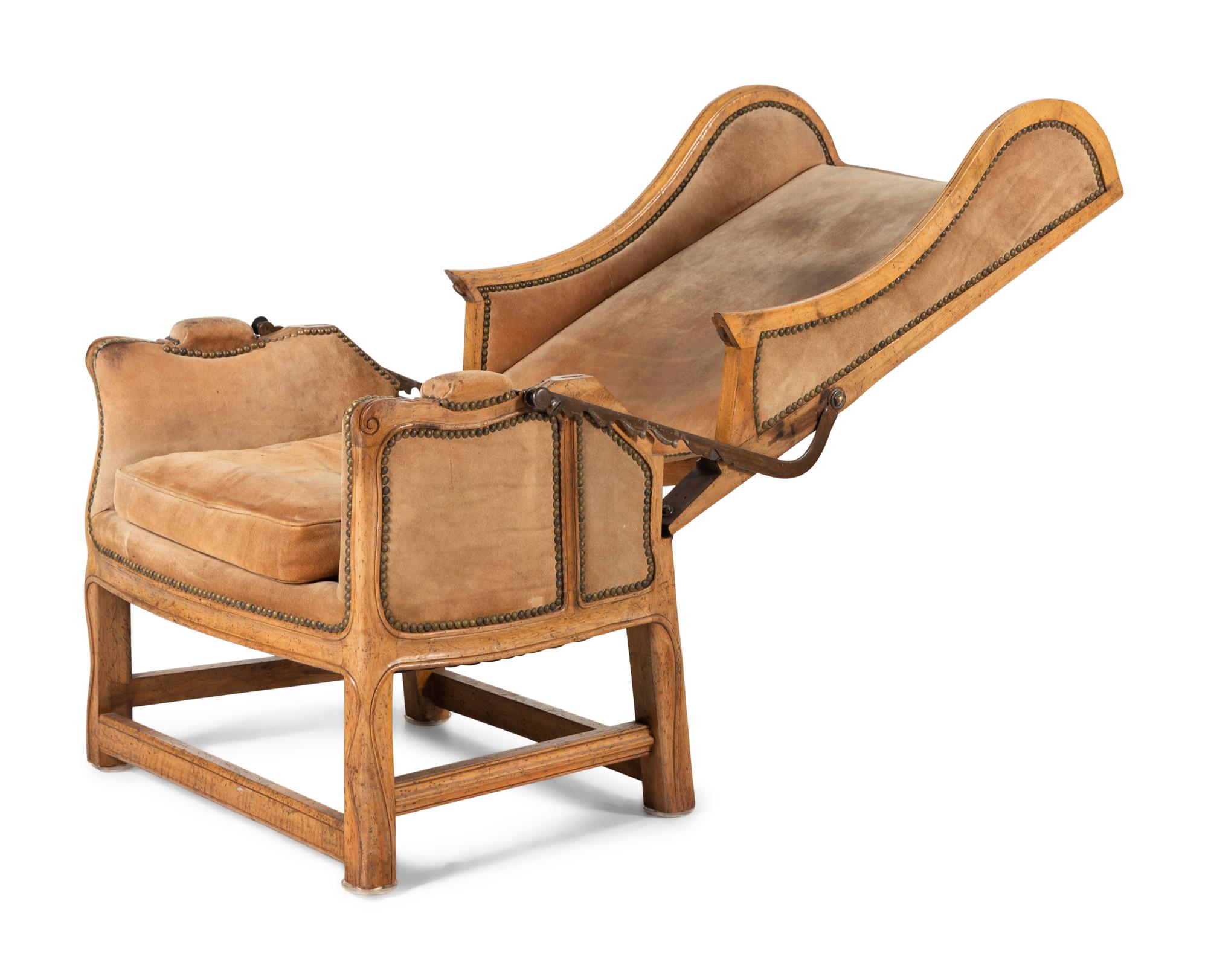 A Louis XV Provincial Style Carved Reclining Easy Chair