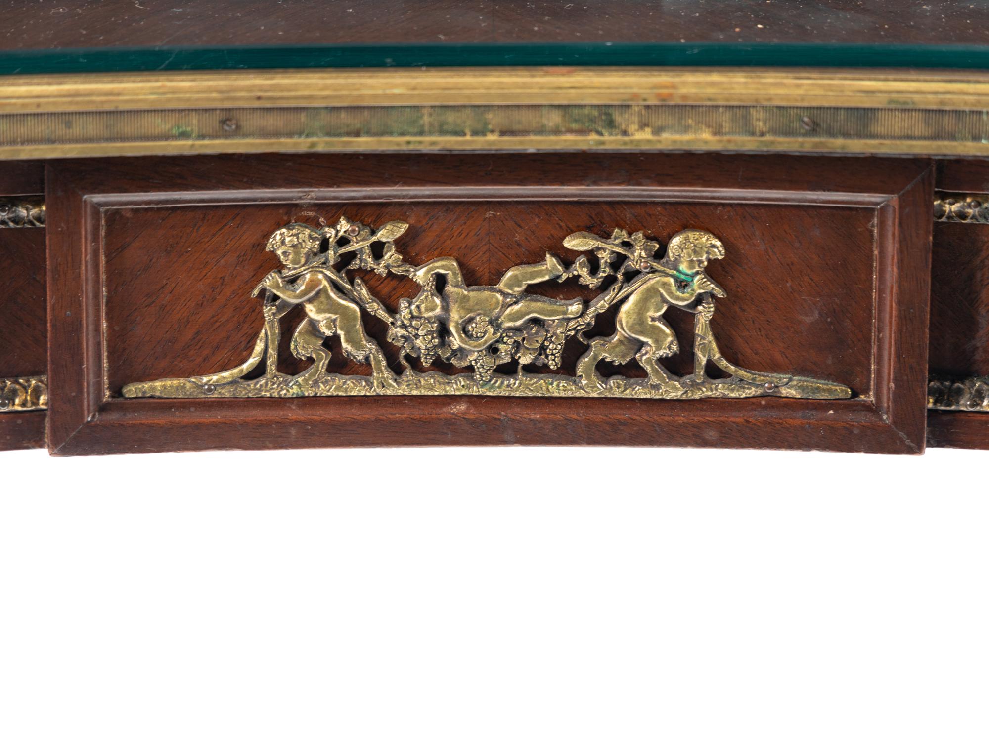 A Louis XVI Style Gilt Bronze Mounted Parquetry Writing Table