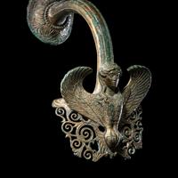 A Greek Bronze Hydria Handle with a Siren