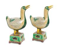 A Pair of Famille Verte Porcelain Duck-Form Covered Vessels Height of each 9 3/4 inches.