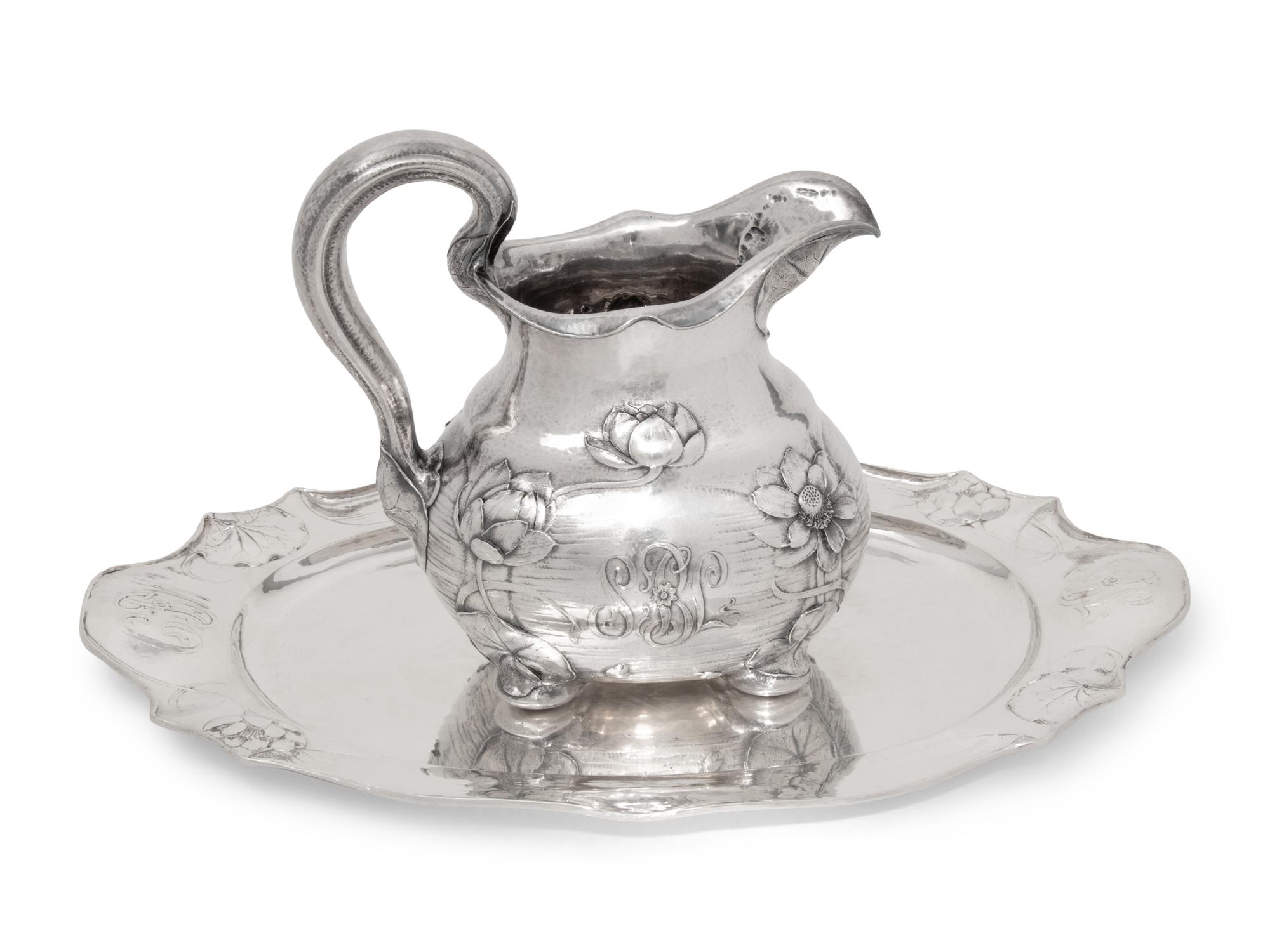 A Gorham Martelé Silver Pitcher and Tray