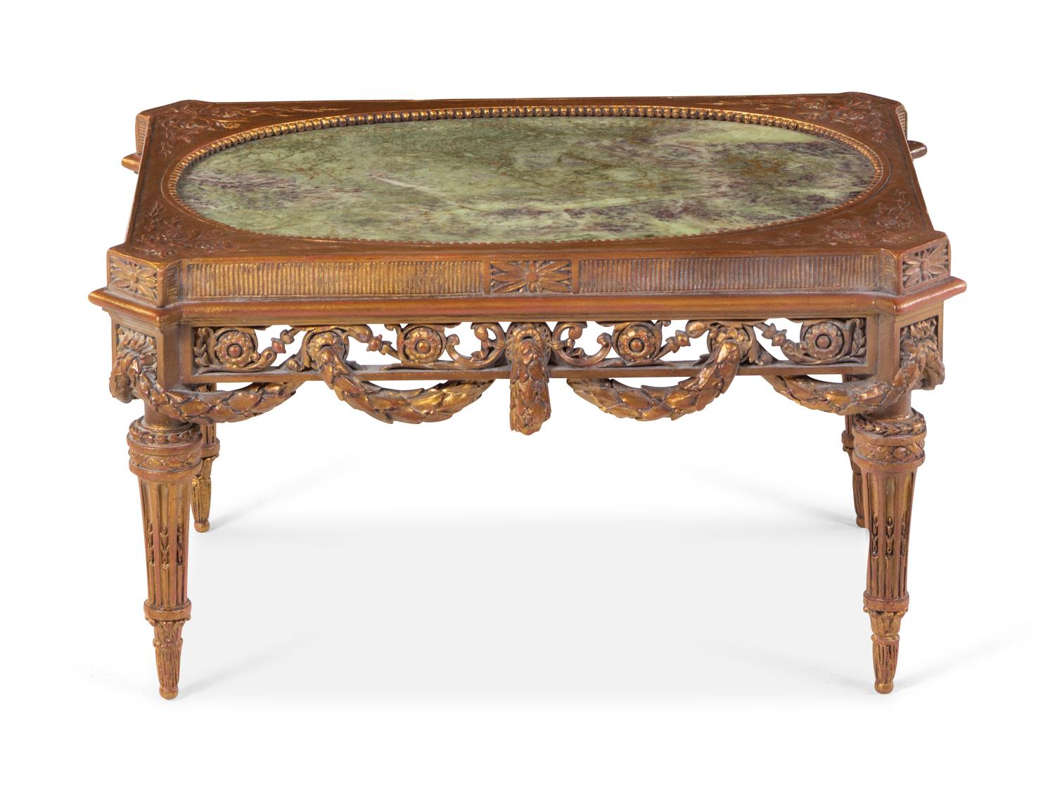 A Louis XVI Style Parcel Gilt Low Table