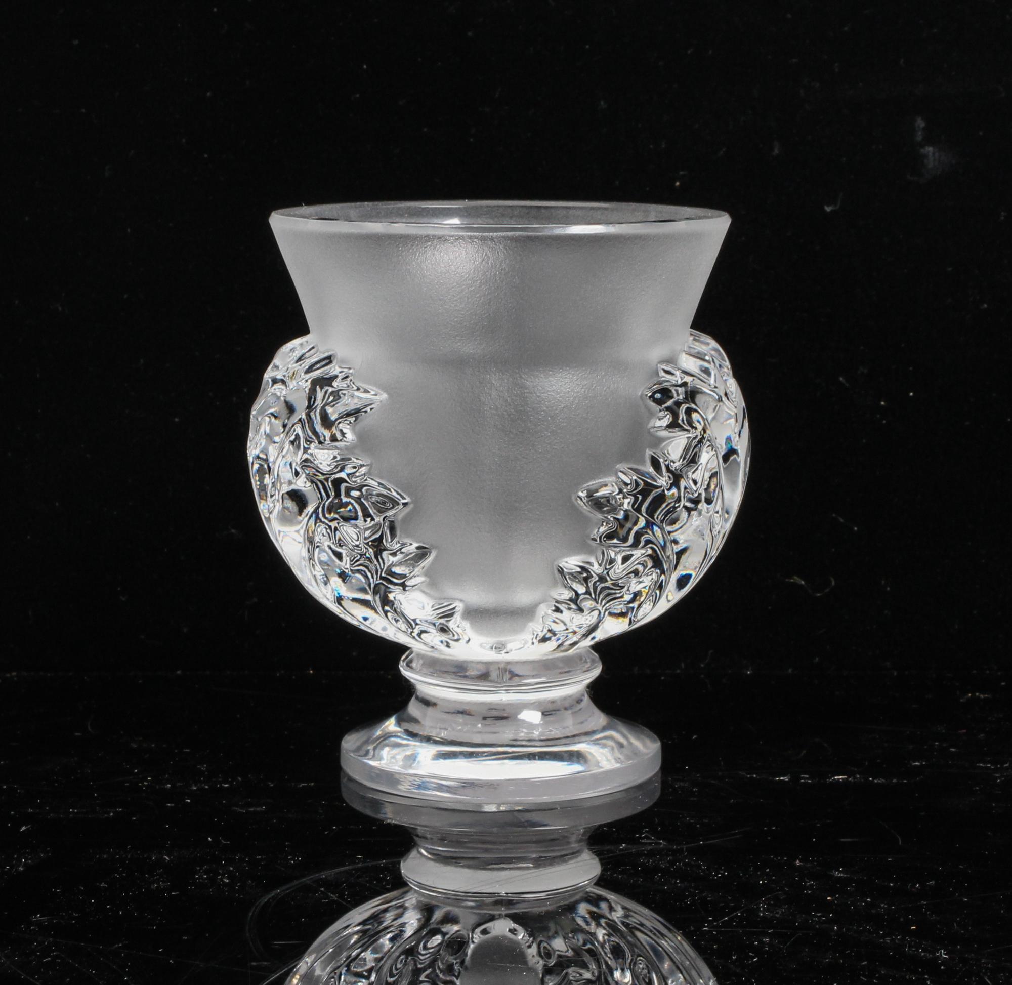 A Lalique Molded and Frosted Glass Vase Height 4 1/2 inches.