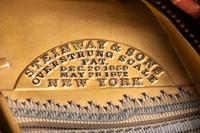 A Steinway and Sons Mahogany Baby Grand Piano