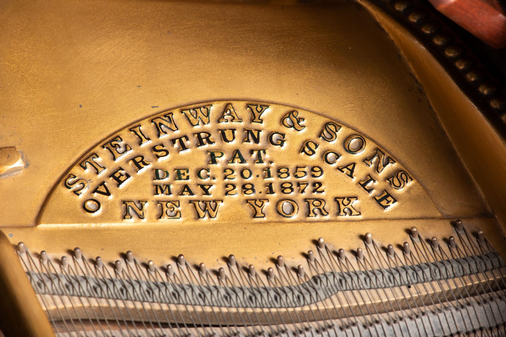 A Steinway and Sons Mahogany Baby Grand Piano