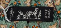 A Group of Three Hermes Silk Ties, 3.15" wide.