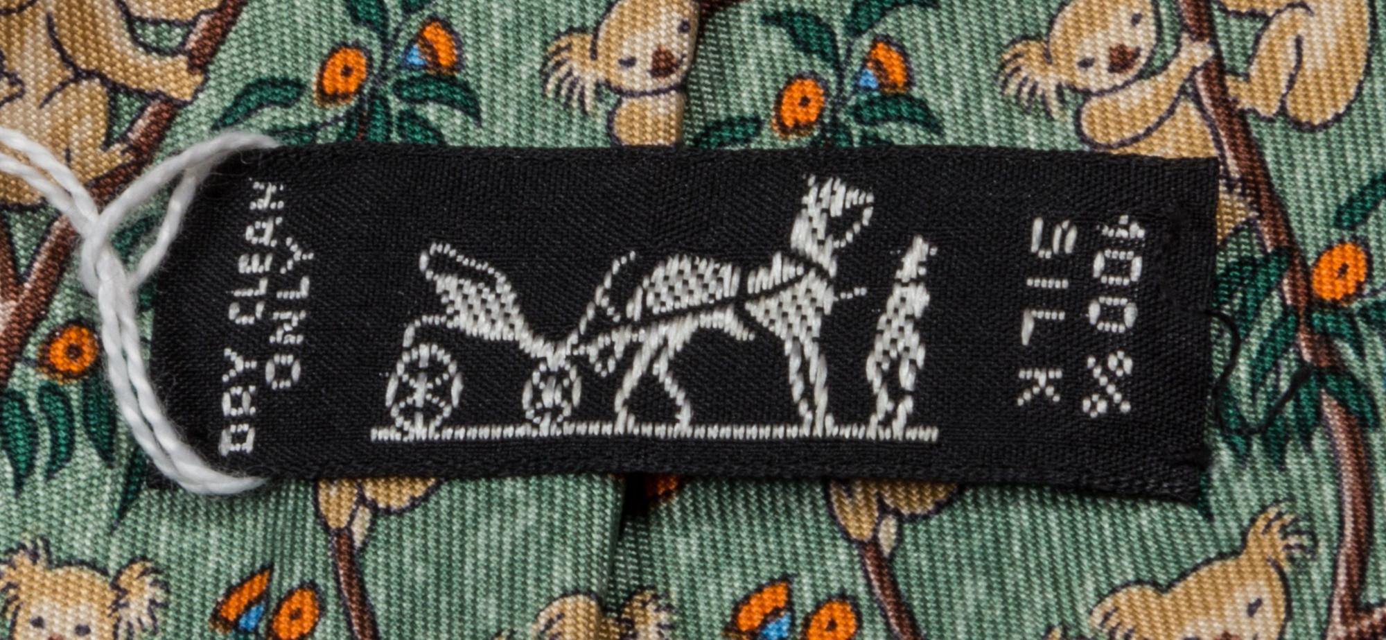 A Group of Three Hermes Silk Ties, 3.15" wide.