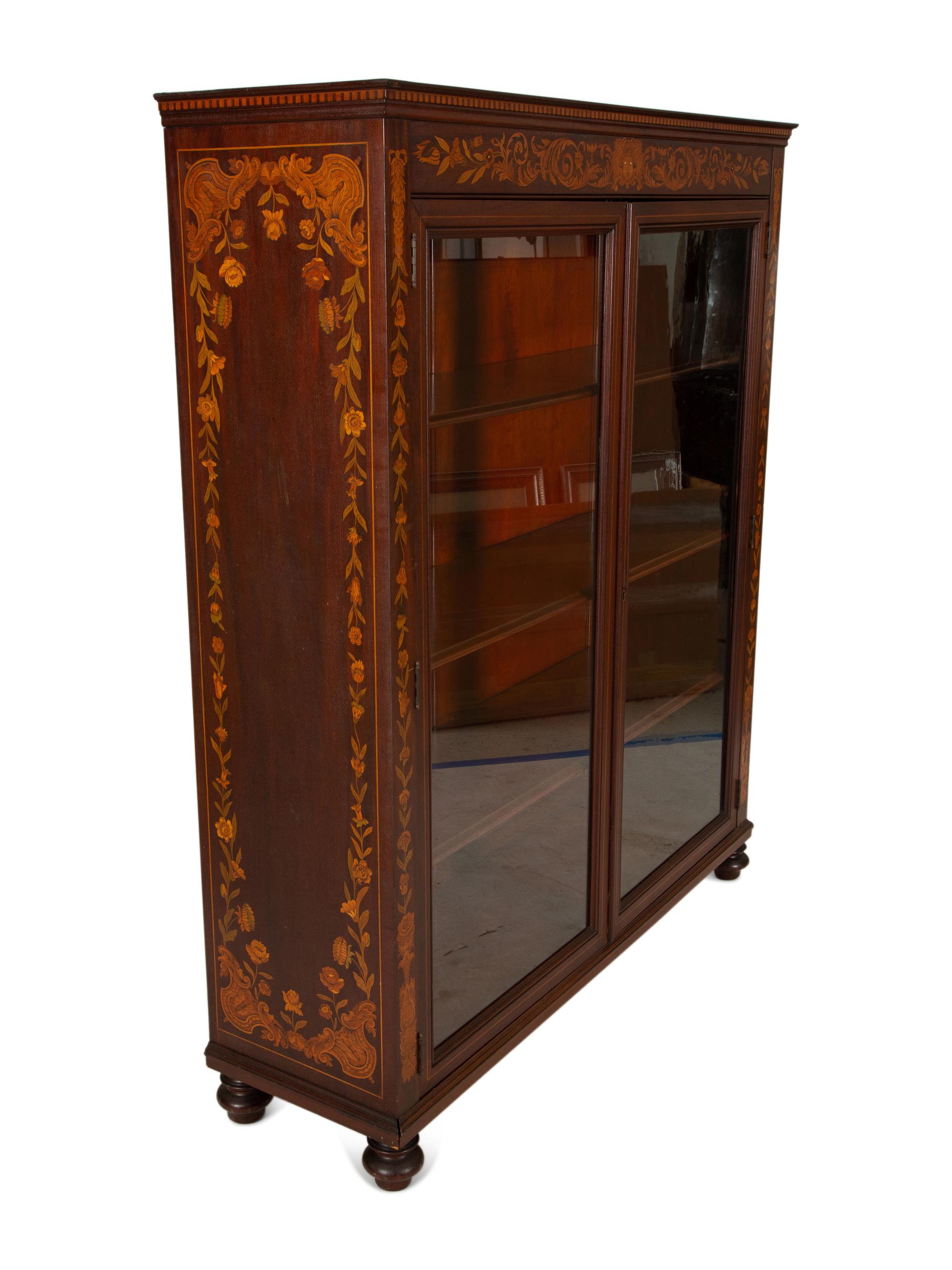 A Dutch Marquetry Style Mahogany Bookcase with Glazed Doors — Early 20th century