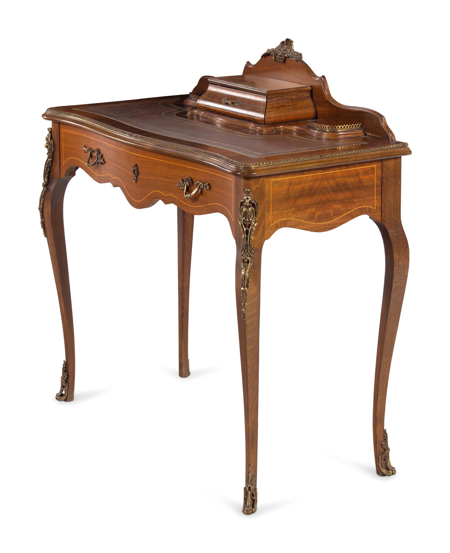 A Louis XV Style Gilt Metal Mounted Writing Desk