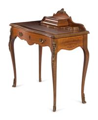 A Louis XV Style Gilt Metal Mounted Writing Desk