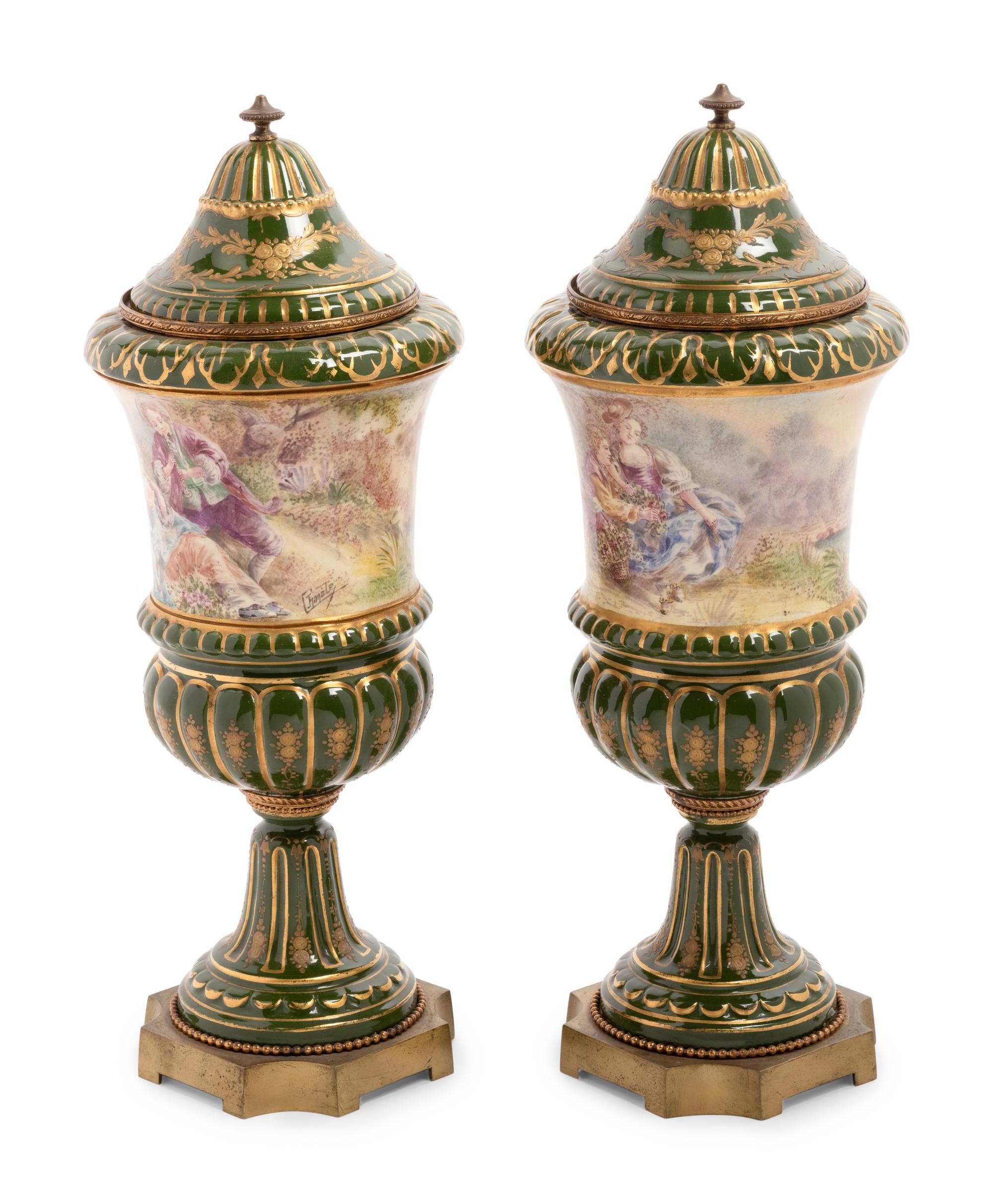 A Pair of Sèvres Style Porcelain Covered Urns