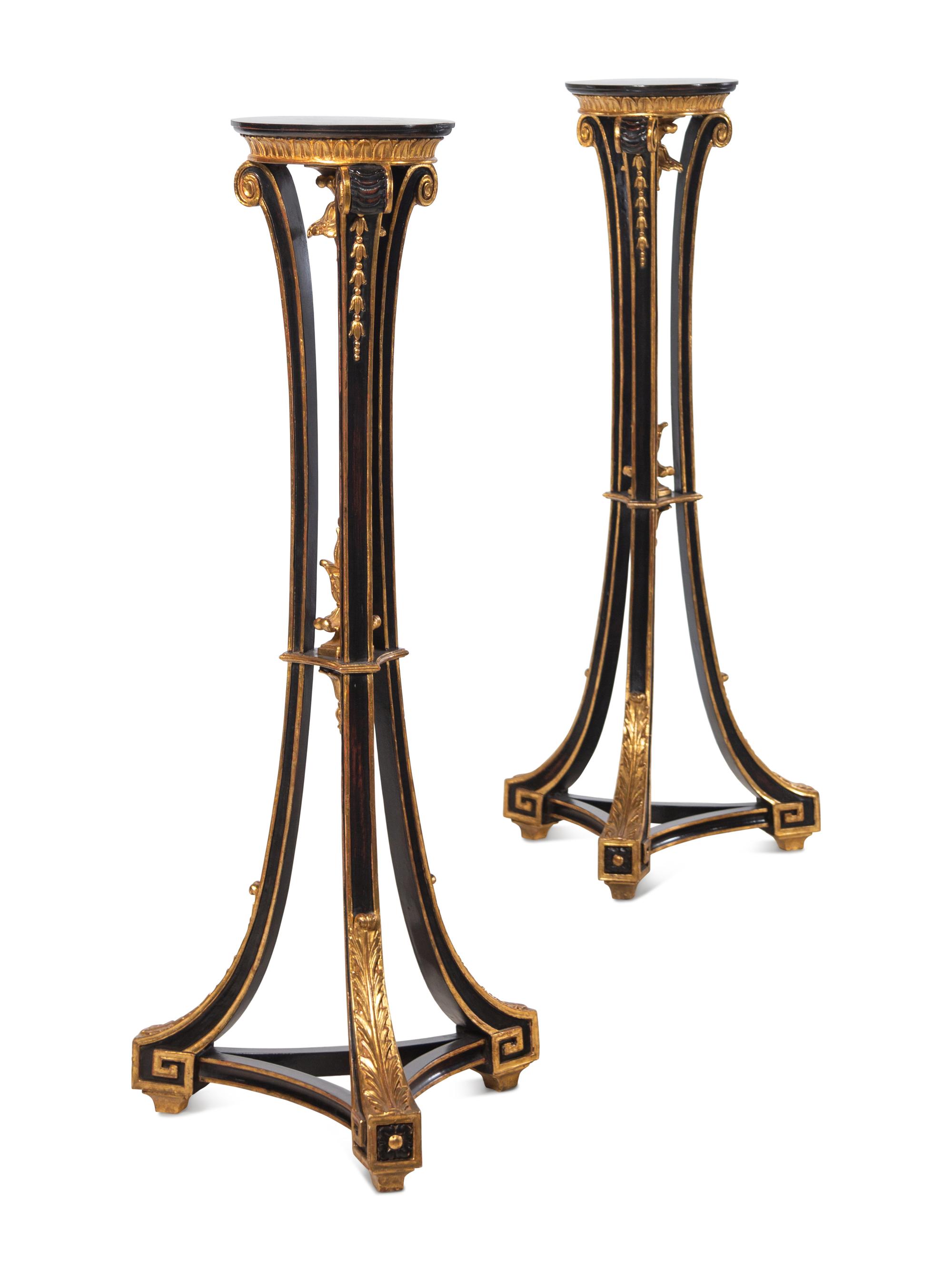 A Pair of Regency Style Black Painted and Parcel Gilt Pedestals