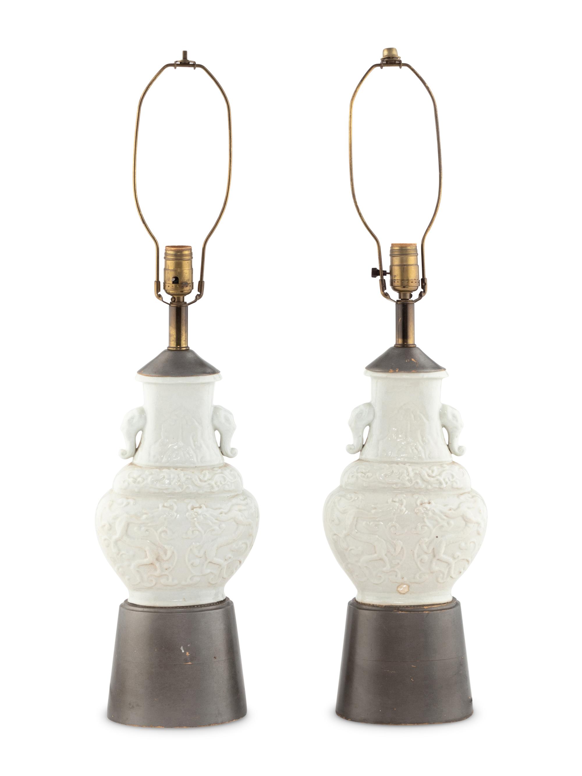 A Pair of Chinese White and Crackled Glazed Molded Porcelain Vases 白釉雙耳瓶一對