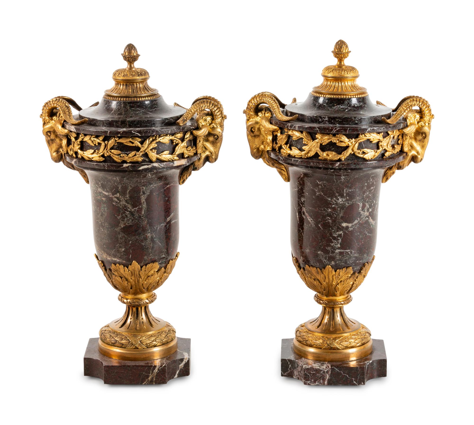 A Pair of Louis XVI Style Gilt Bronze Mounted Marble Urns