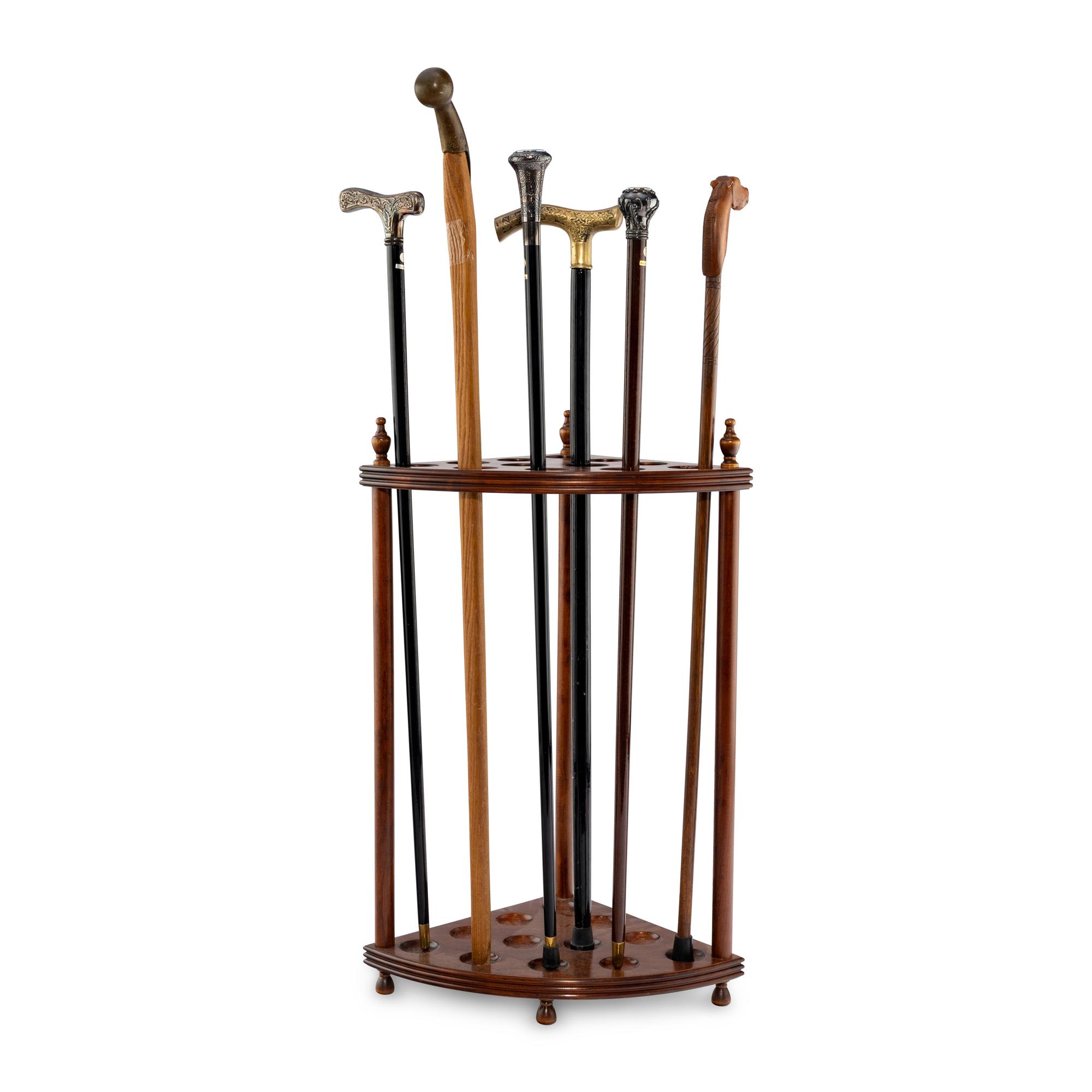 A Collection of Six Gentleman's Walking Sticks with Stand