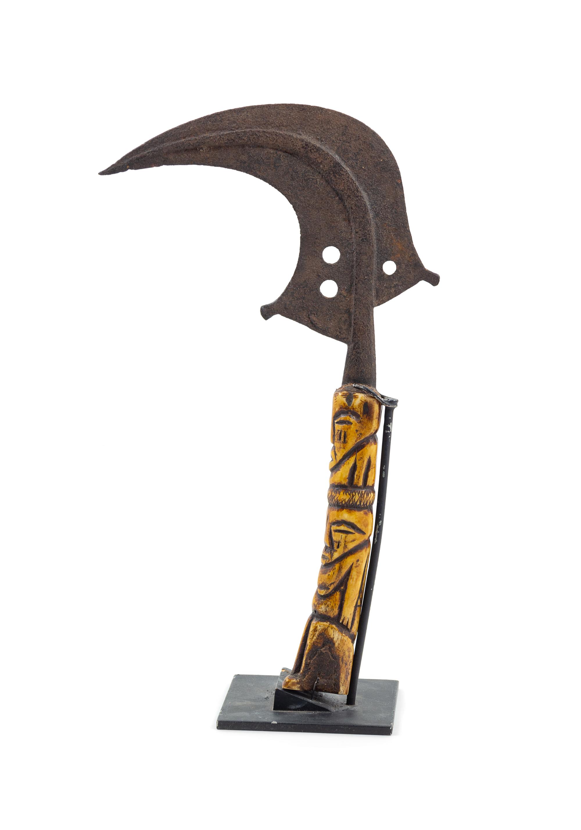 An African Carved Bone and Metal Knife Height 15 inches. — 20TH CENTURY