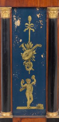 A Continental Parcel Gilt, Ebonized Walnut and Églomisé Overmantel Mirror
