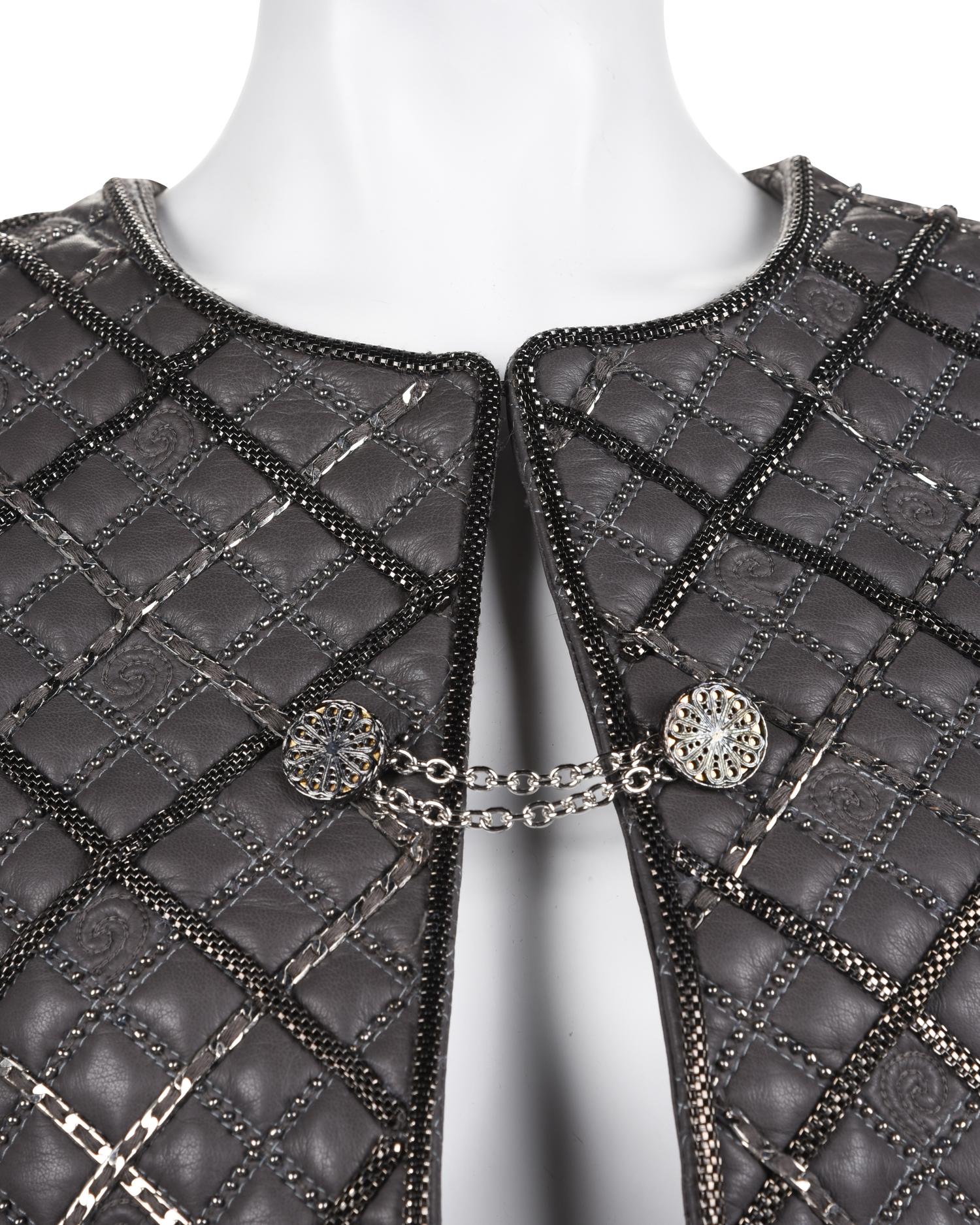 Three Designer Items: One Giorgio Armani Jacket and Top, and One Oscar de la Renta Jacket, 2000s