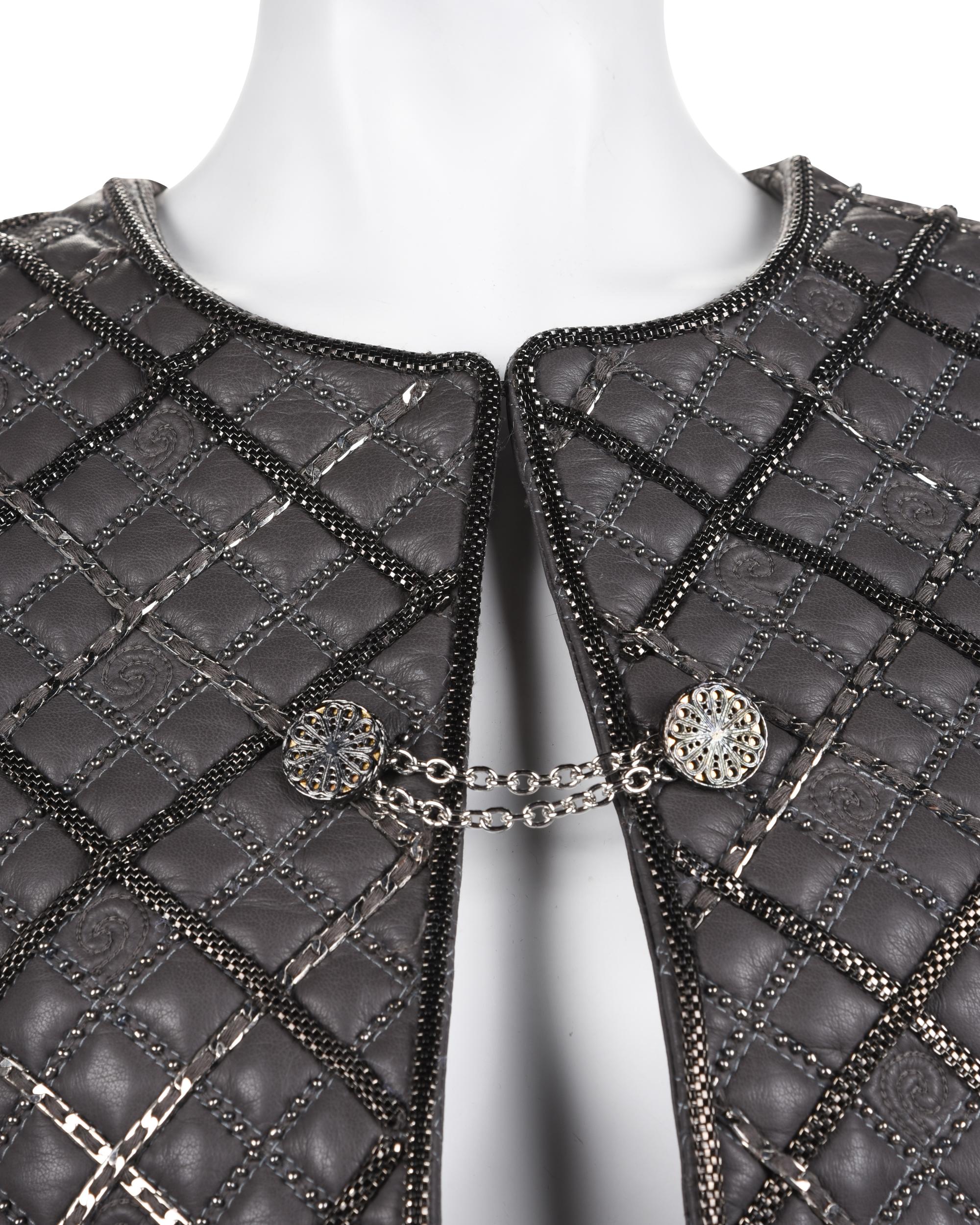 Three Designer Items: One Giorgio Armani Jacket and Top, and One Oscar de la Renta Jacket, 2000s