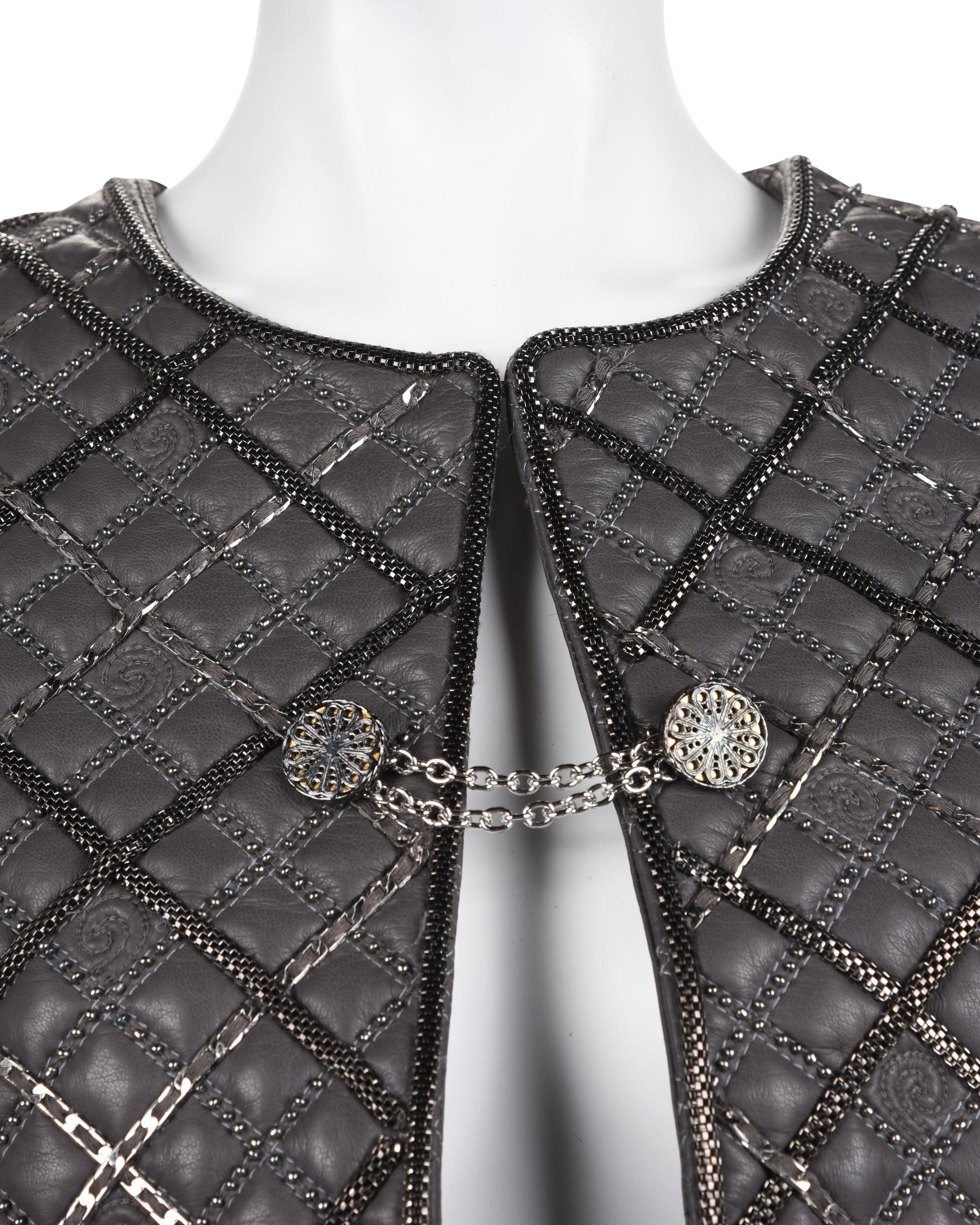Three Designer Items: One Giorgio Armani Jacket and Top, and One Oscar de la Renta Jacket, 2000s