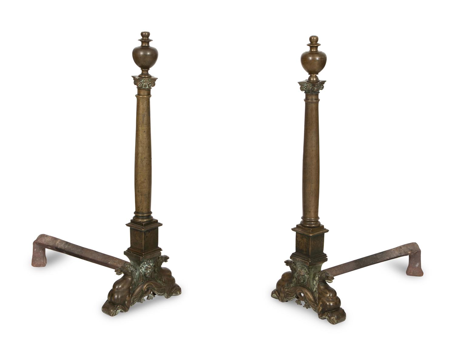 A Pair of Large Patinated Metal Andirons