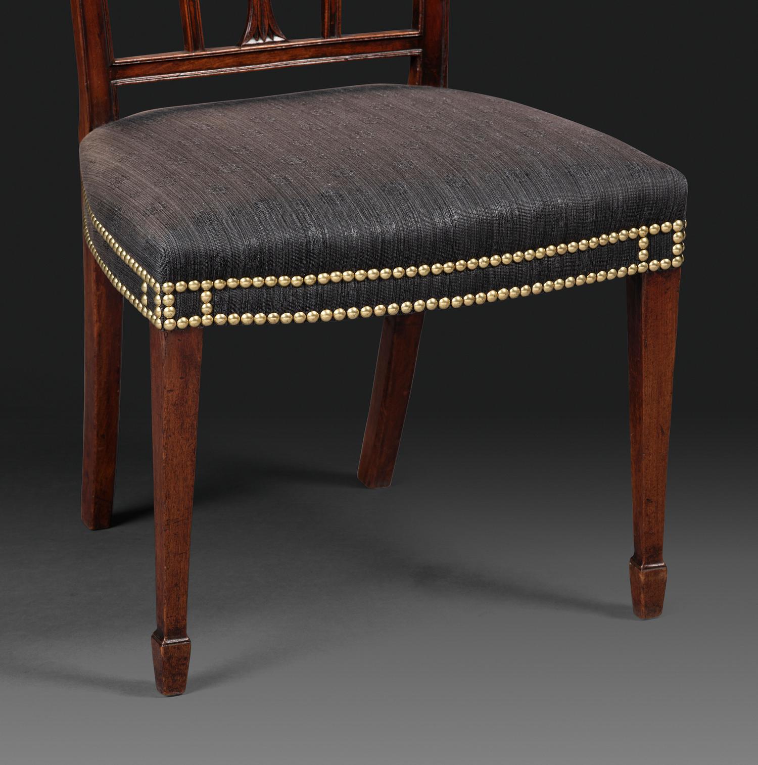 A Set of Eight Federal Carved Mahogany Dining Chairs