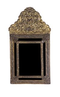 A Dutch Brass Wall Mirror, Height 24 x width 12 3/4 inches.
