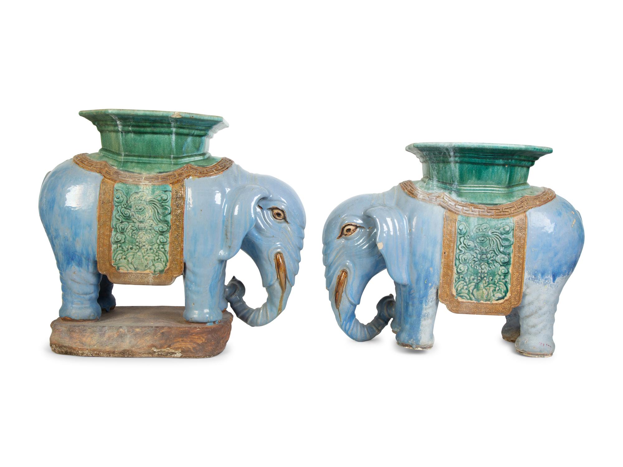 A Near Pair of Chinese Ceramic Elephant-Form Garden Stools — 20TH CENTURY