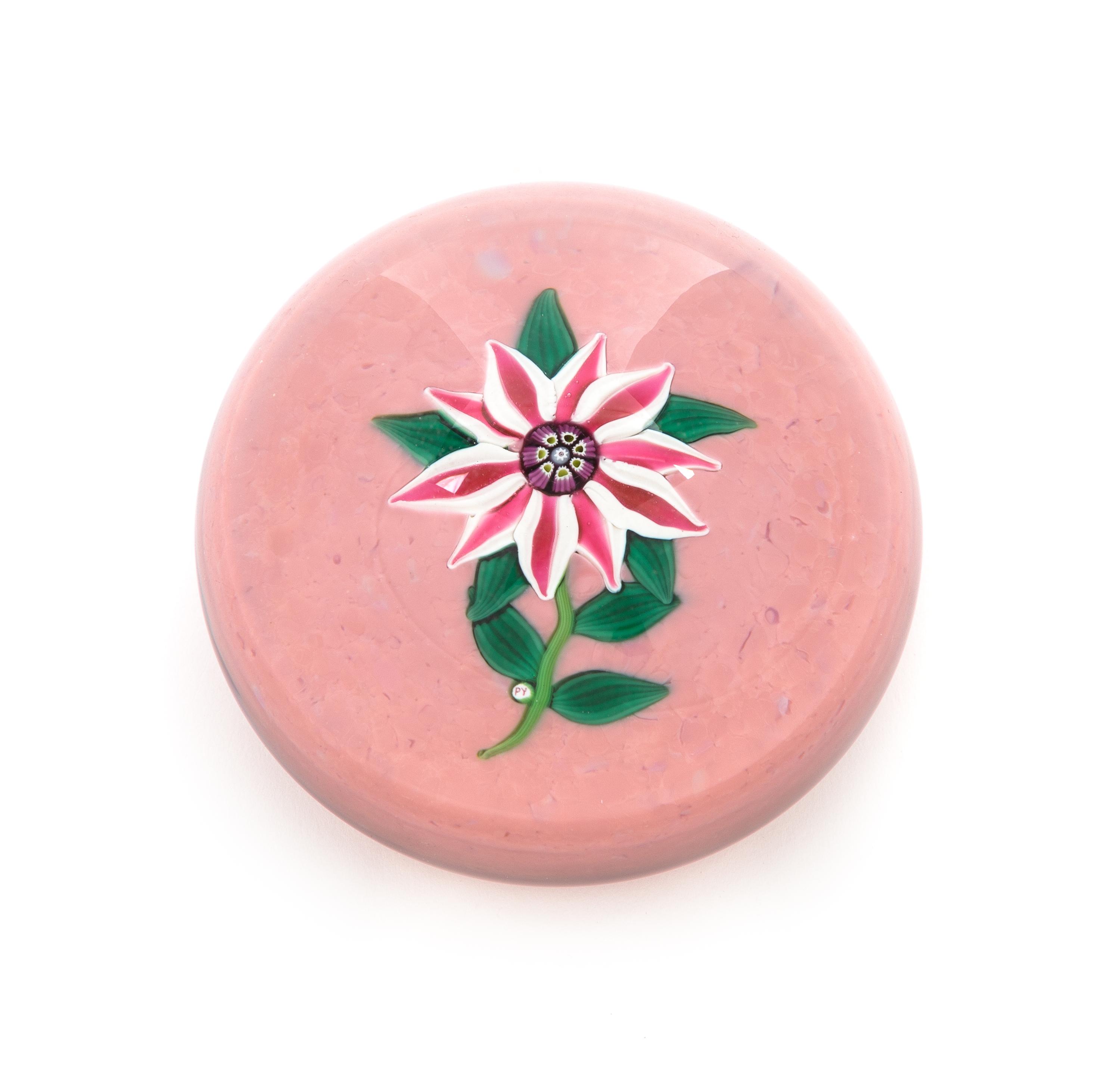 Paul Ysart , (Spanish, 1904-1991), a pink and white clematis paperweight