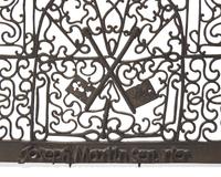 A Wrought Iron Door Grill and Scrolled Wrought Iron Architectural Element, French, 18th Century
