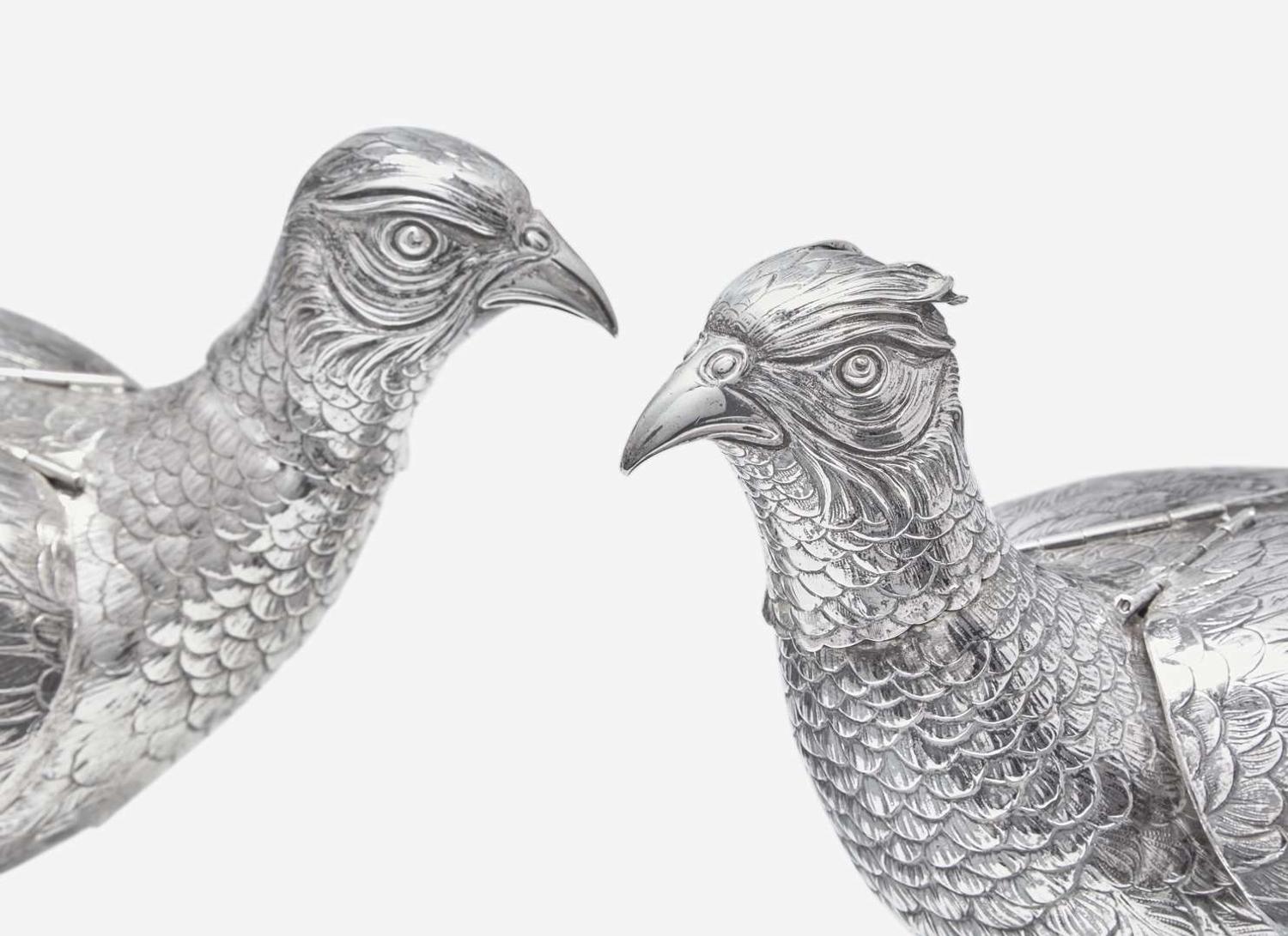 A pair of .800 silver pheasant-form decanters, Vereinigte Silberwarenfabrik, Hanau, Germany, early 20th century