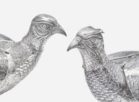 A pair of .800 silver pheasant-form decanters, Vereinigte Silberwarenfabrik, Hanau, Germany, early 20th century