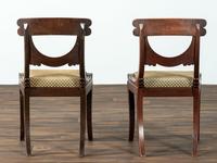 A Pair of Classical Drapery Carved Mahogany Side Chairs