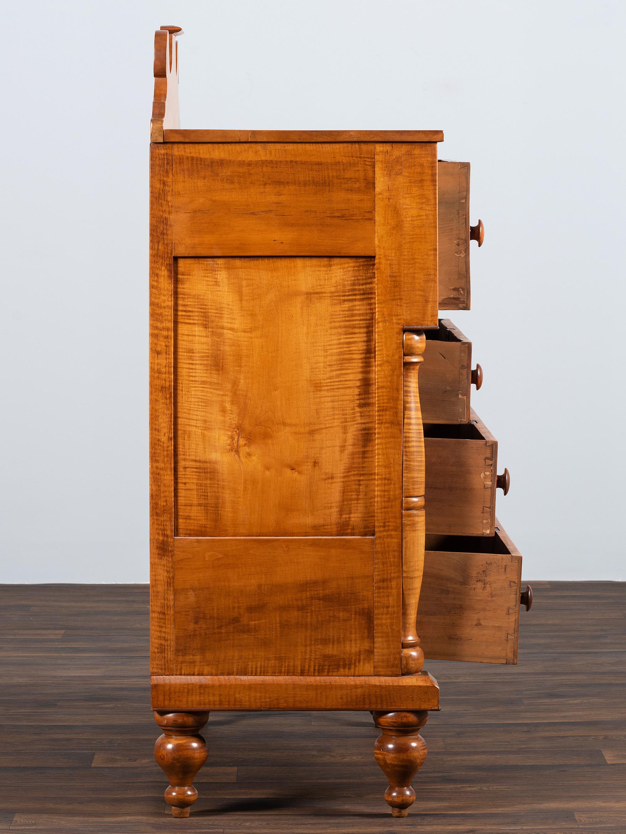 A Late Federal Tiger Maple Chest of Drawers