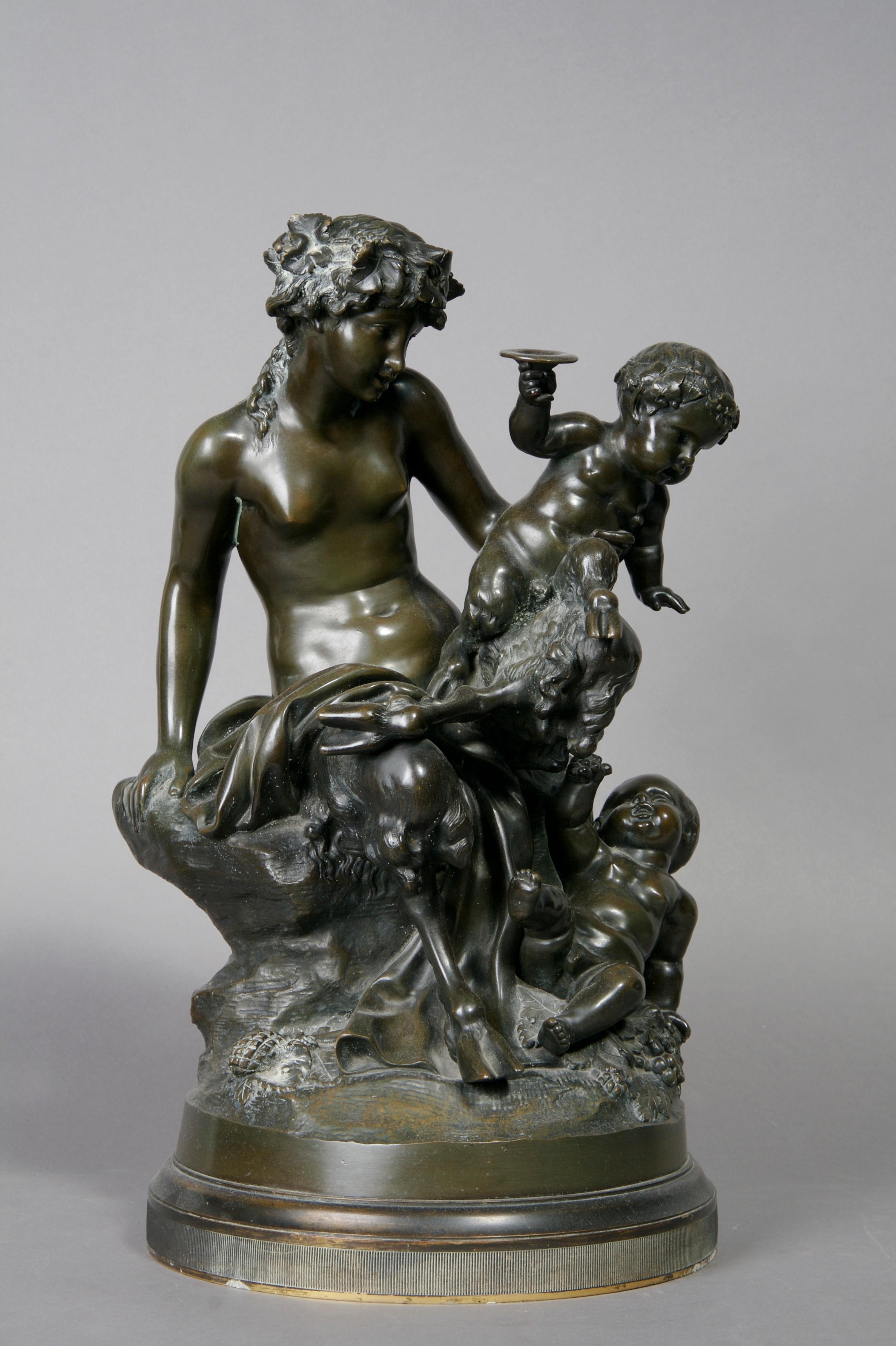 A Continental Bronze Figural Group, after Clodion, Height 17 inches.