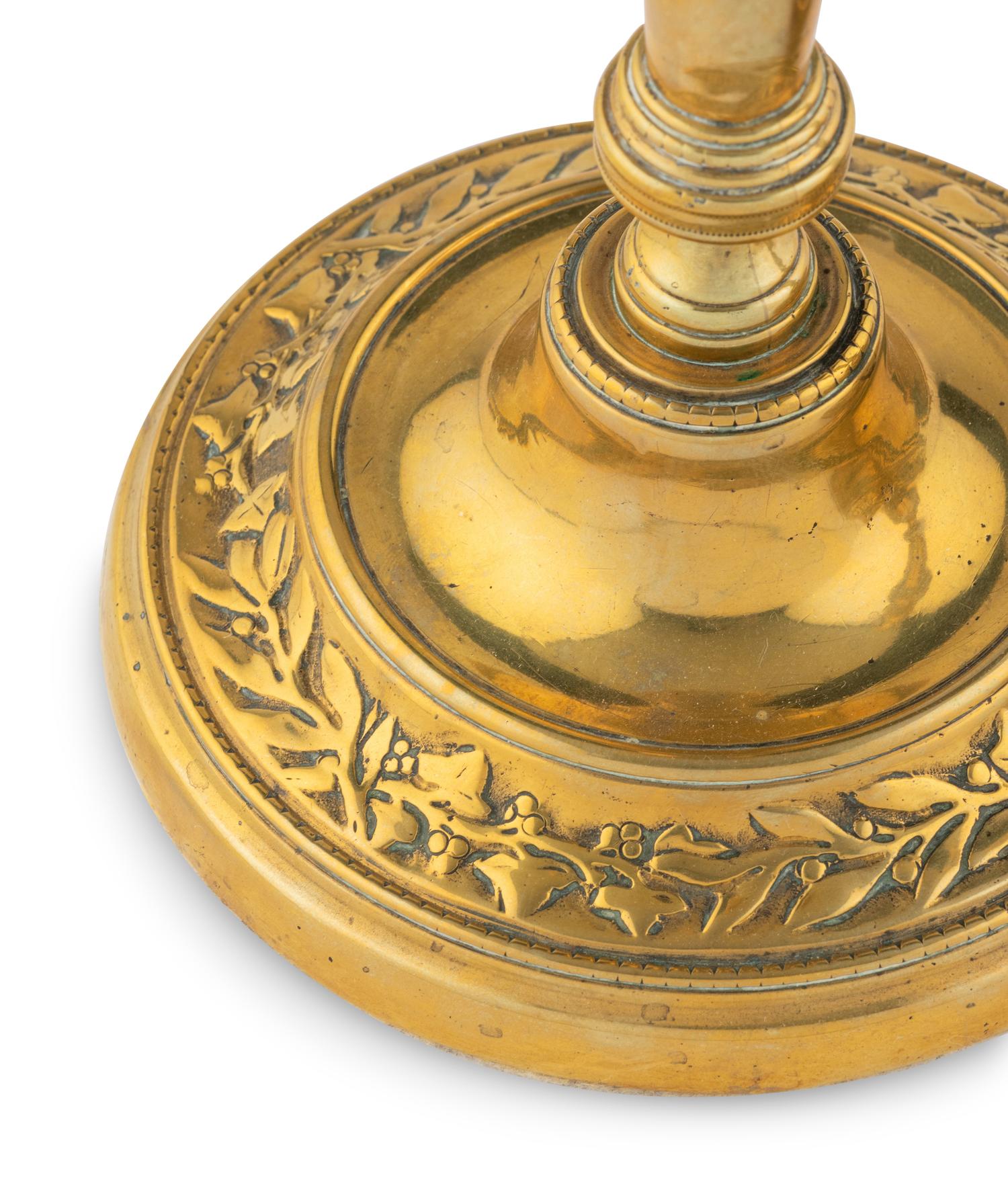 A Pair of Louis XV Brass Candlesticks