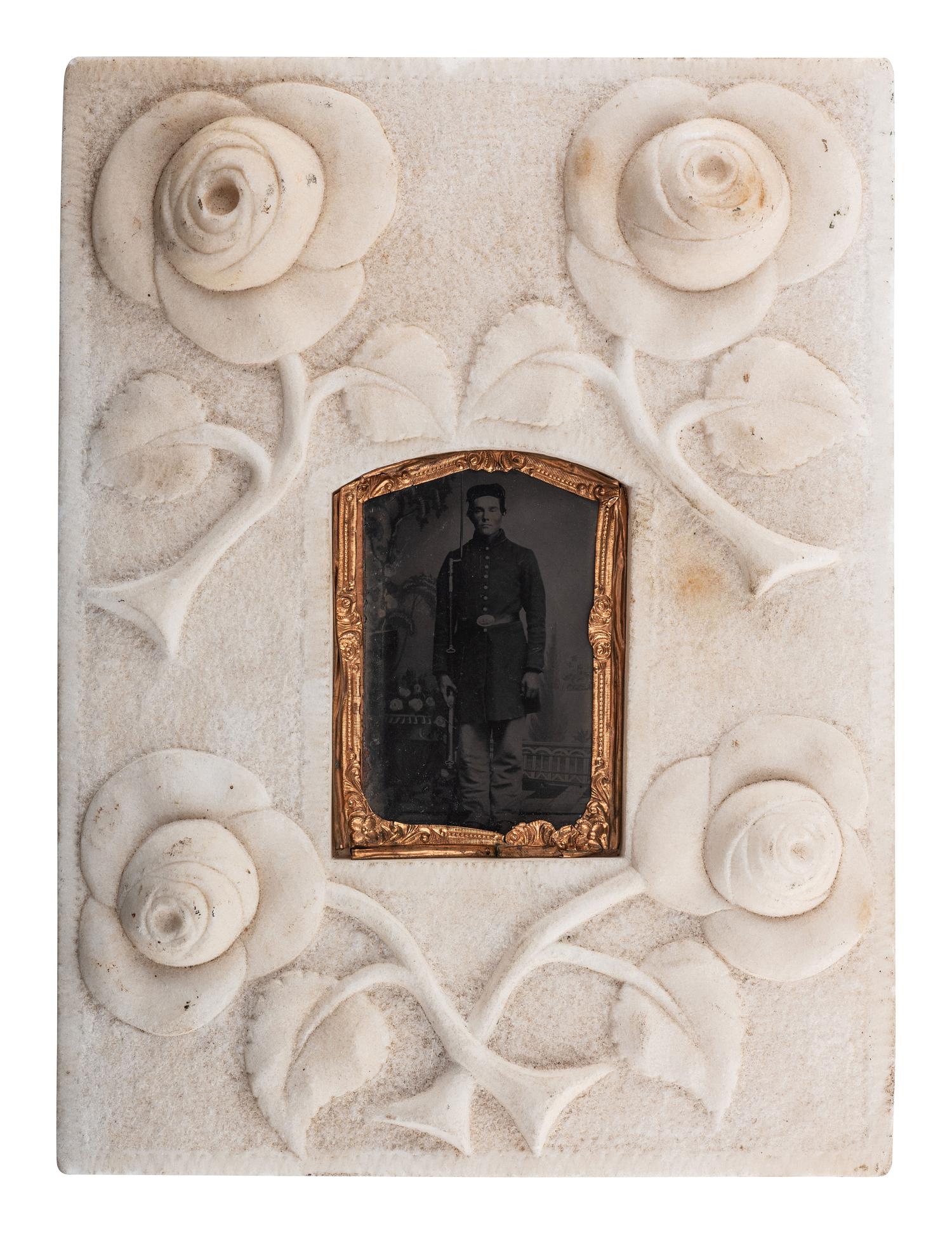 [CIVIL WAR]. Tintype of soldier housed in folk art carved stone frame.