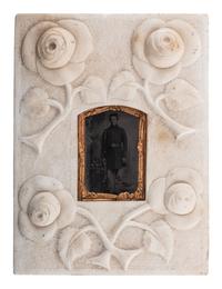 [CIVIL WAR]. Tintype of soldier housed in folk art carved stone frame.