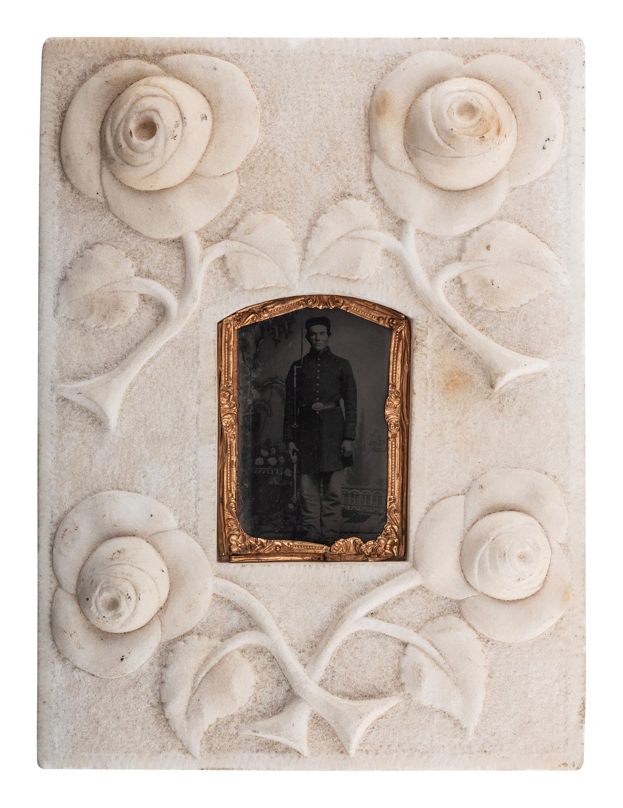 [CIVIL WAR]. Tintype of soldier housed in folk art carved stone frame.