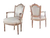 A Pair of Louis XVI Limed Beech Fauteuils