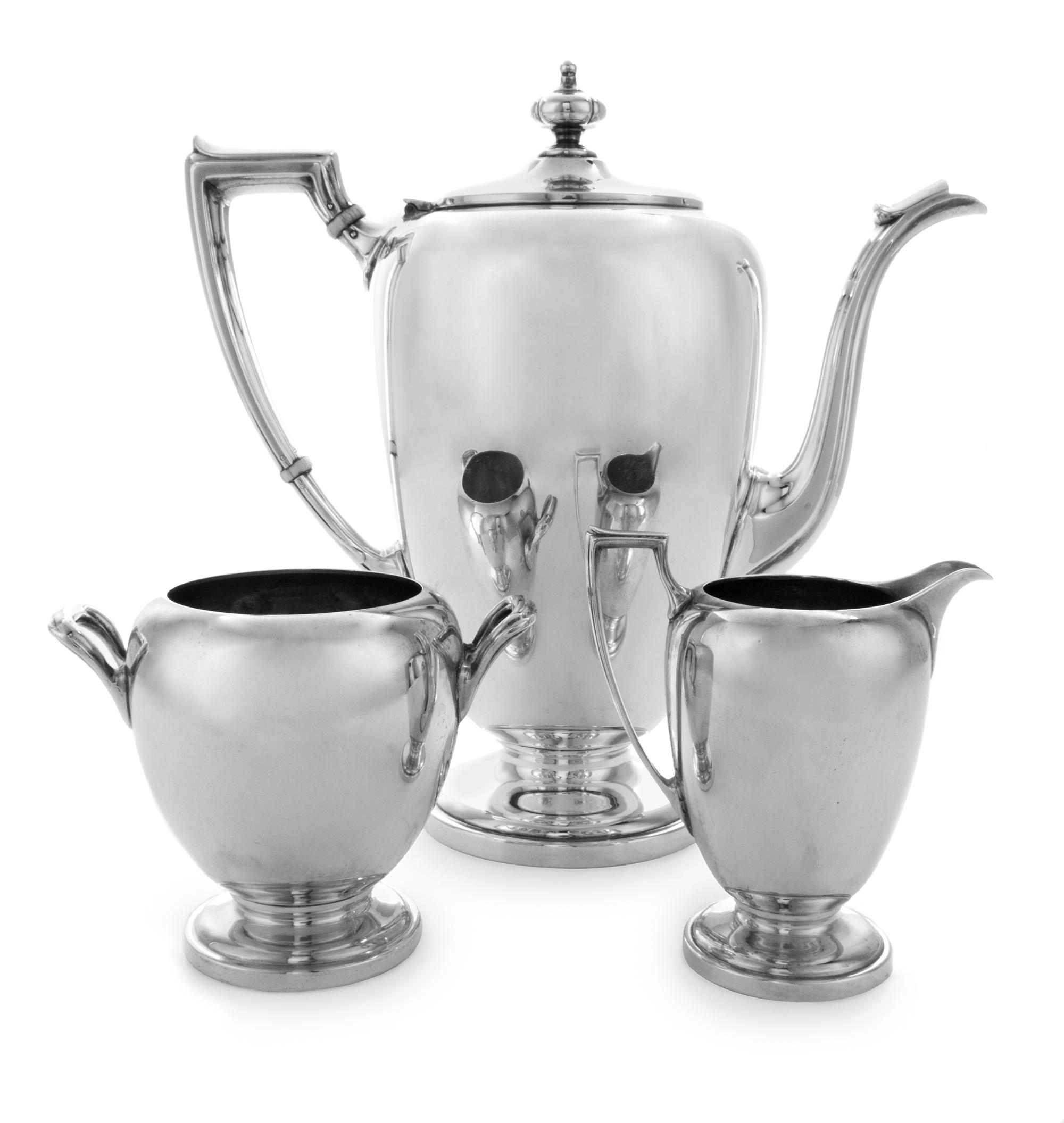 An American Silver Three-Piece Tea Service, Reed & Barton, Taunton, MA, 1949, in the Pointed Antique pattern, comprising a teapot, a cr
