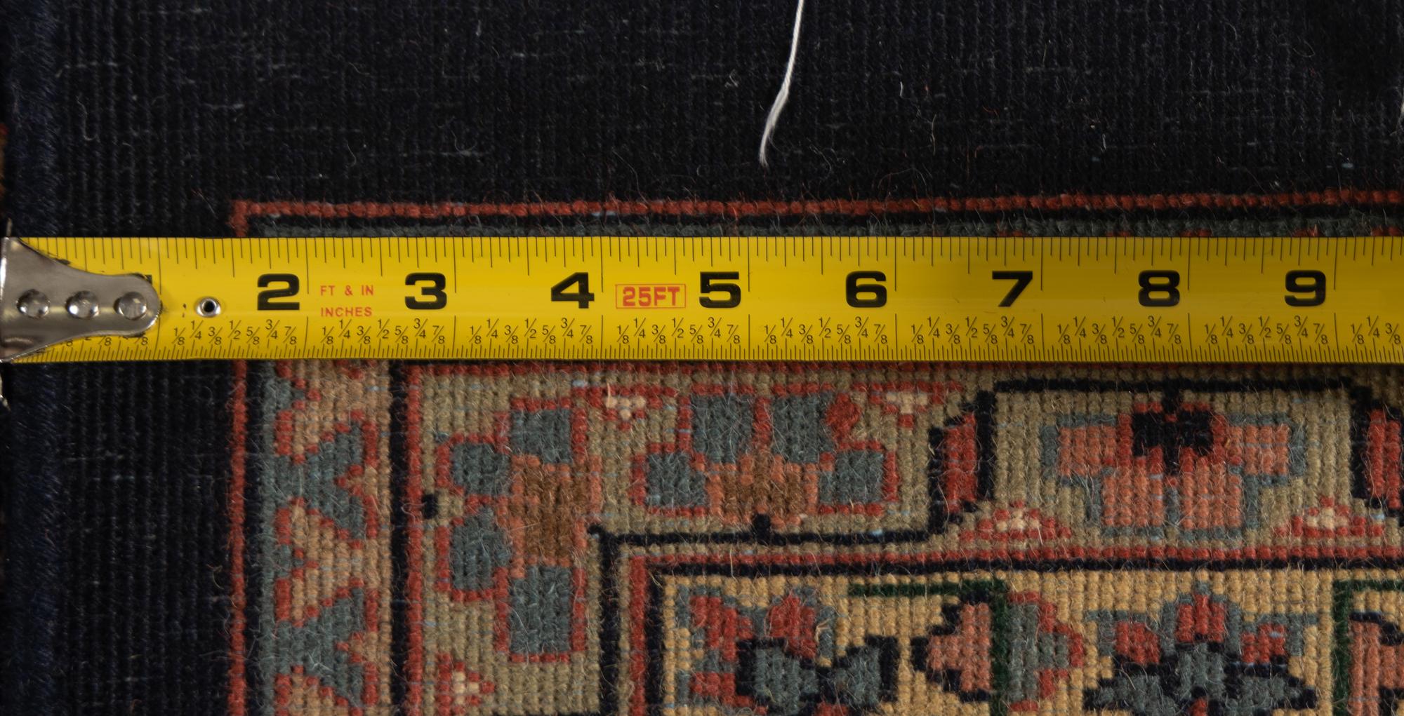An Indo Tabriz Wool Rug