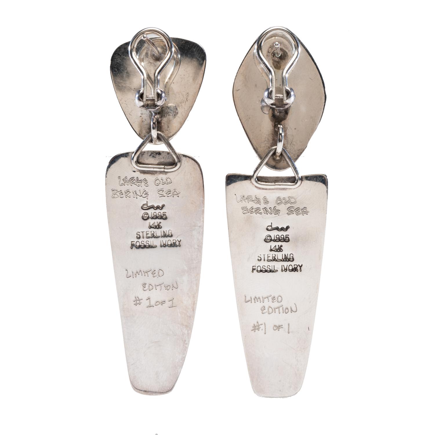 Large & Old Bering Sea , 1995 Sterling Silver Earrings, Accented with 14K Gold and Set with Fossilized Walrus Ivory Lot is located and will ship from Denver, Colorado.