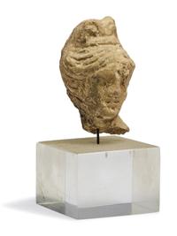 A Greek Terracotta Female Head