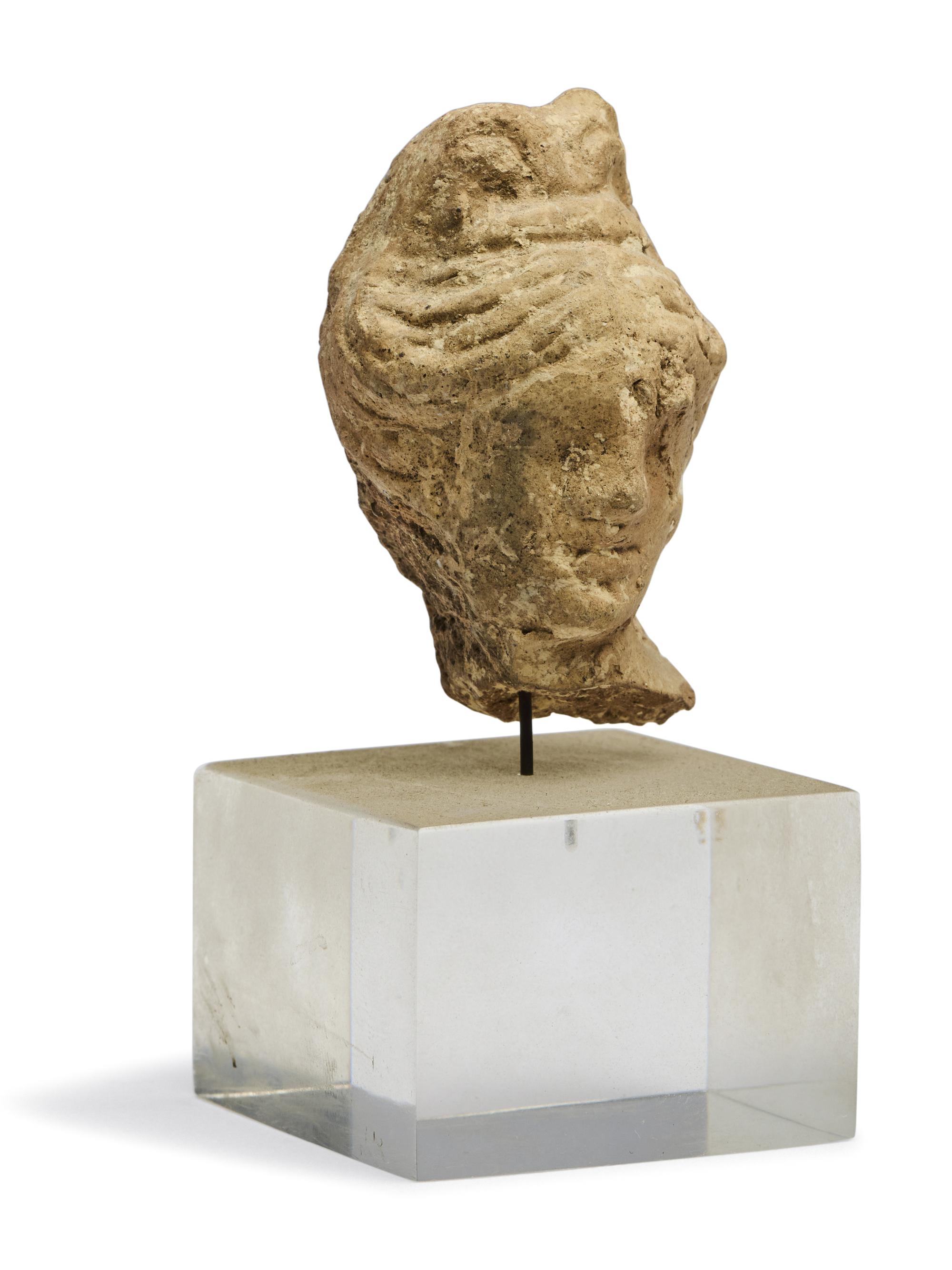A Greek Terracotta Female Head