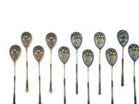 Thirty Russian Silver and Enamel Spoons and Forks