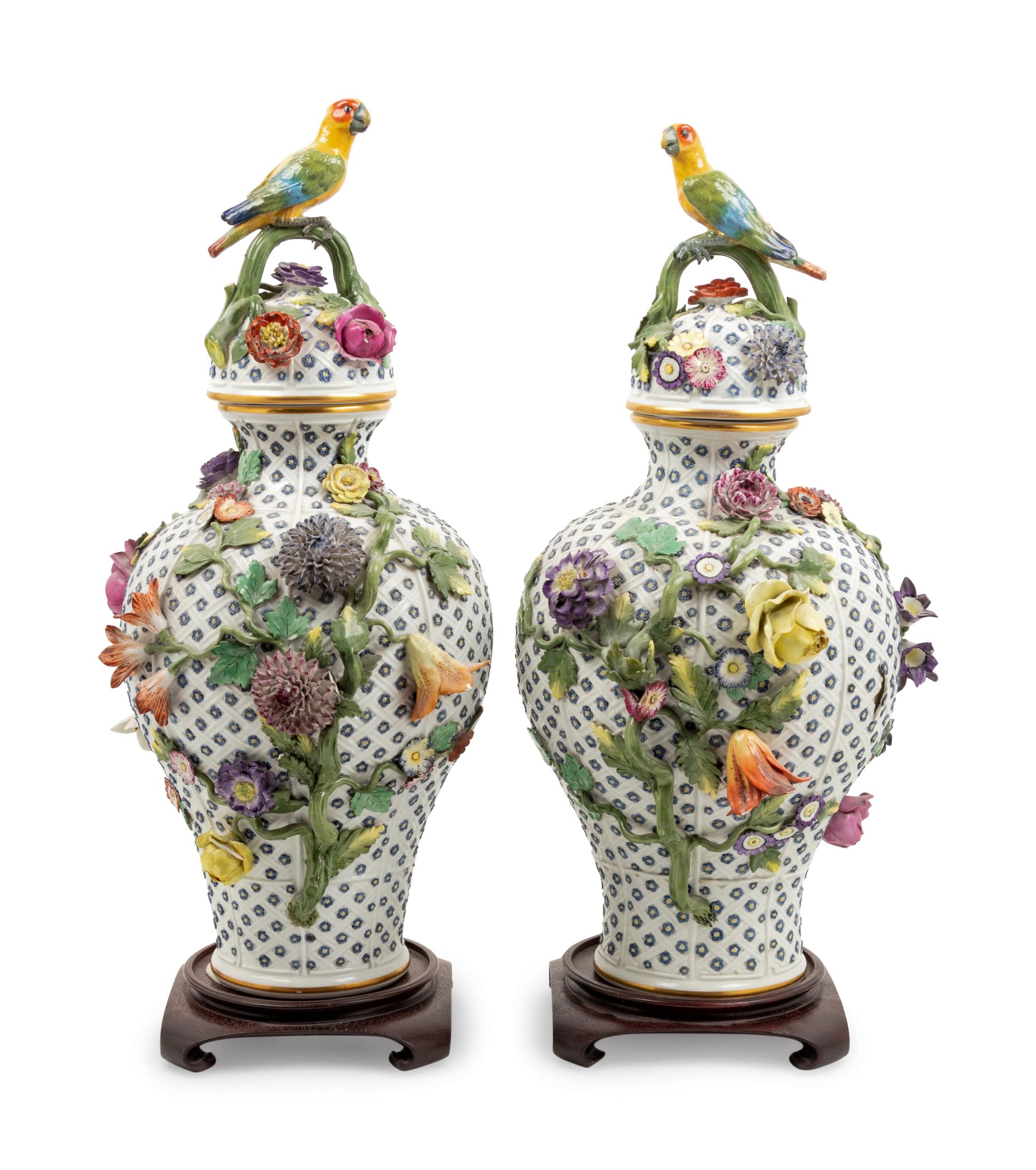 A Pair of Continental Porcelain Covered Urns