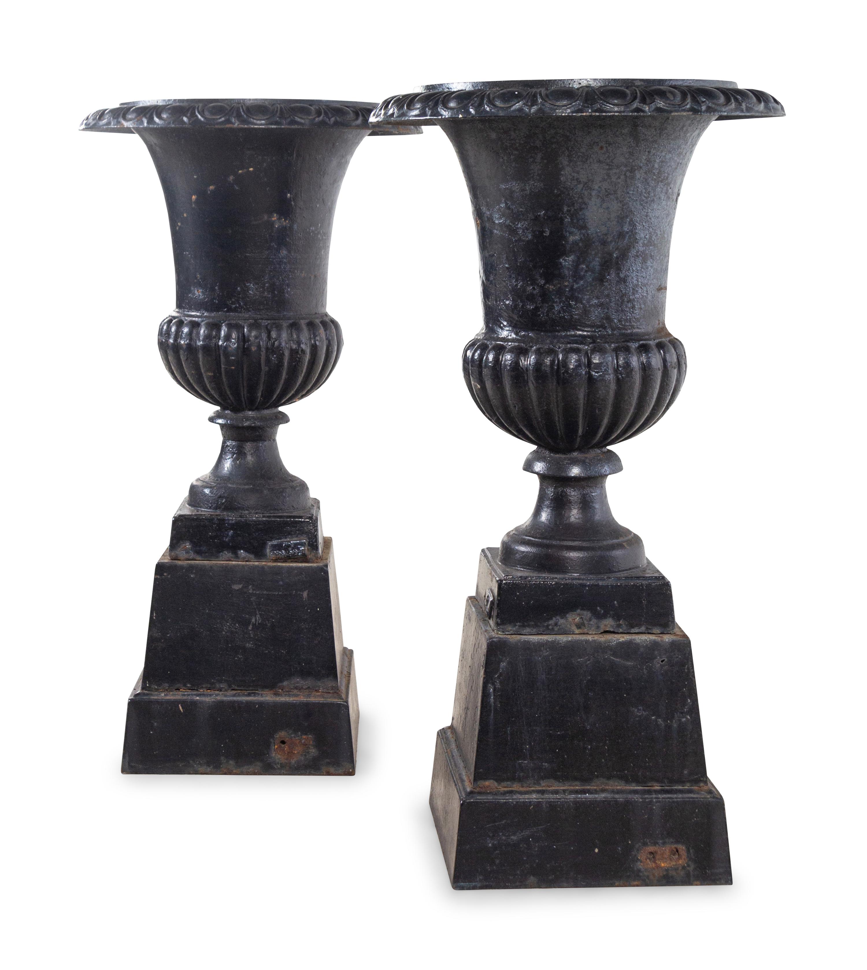 A Pair of German Painted Iron Garden Urns