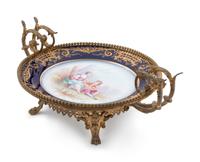 A Sèvres Style Bronze Mounted Painted and Parcel Gilt Porcelain Compote