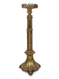 A Gothic Revival Gilt Metal Pricket